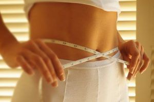 Woman Measuring Waist